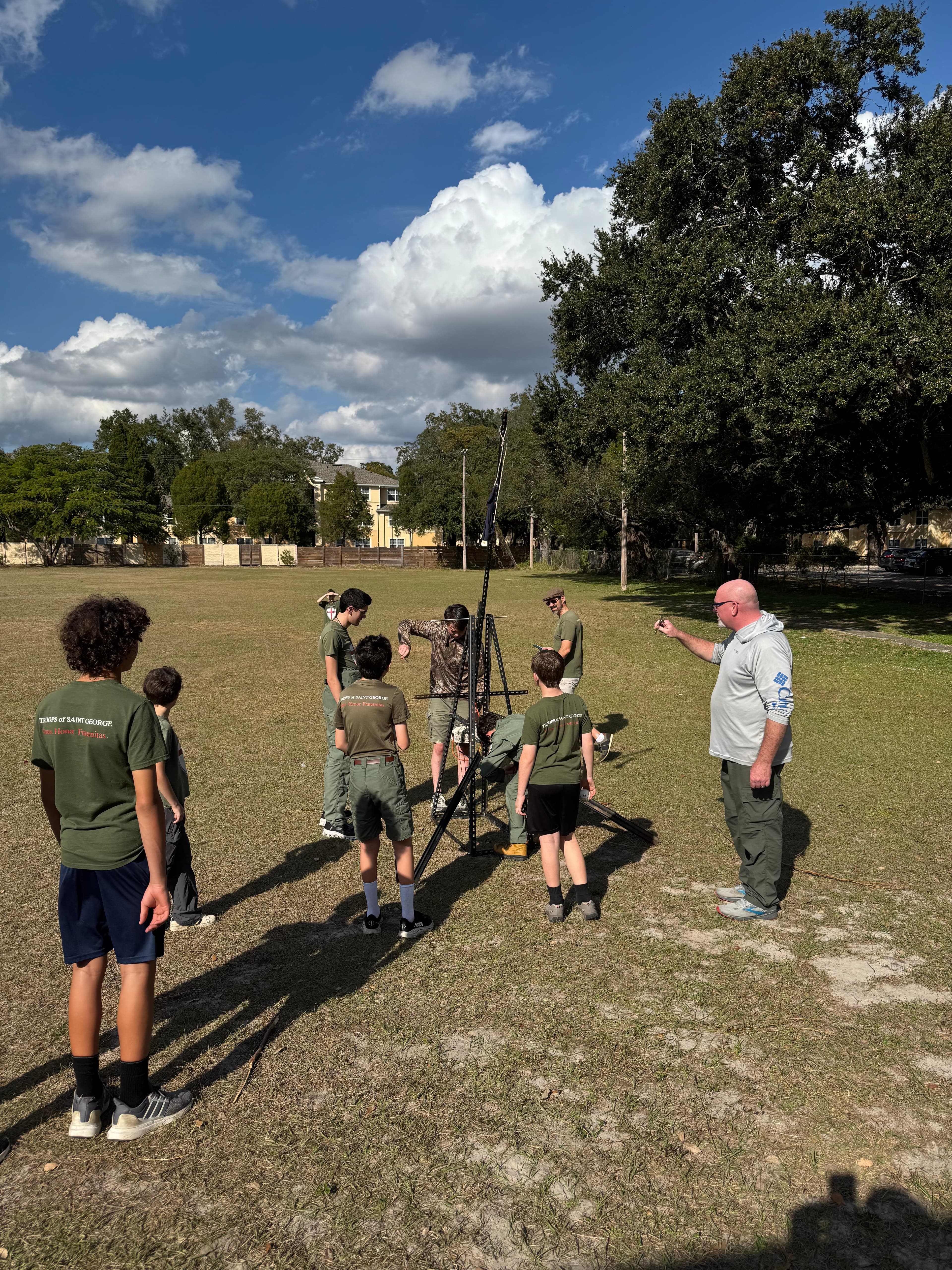 Troop 51 boys working on an outdoor field activity