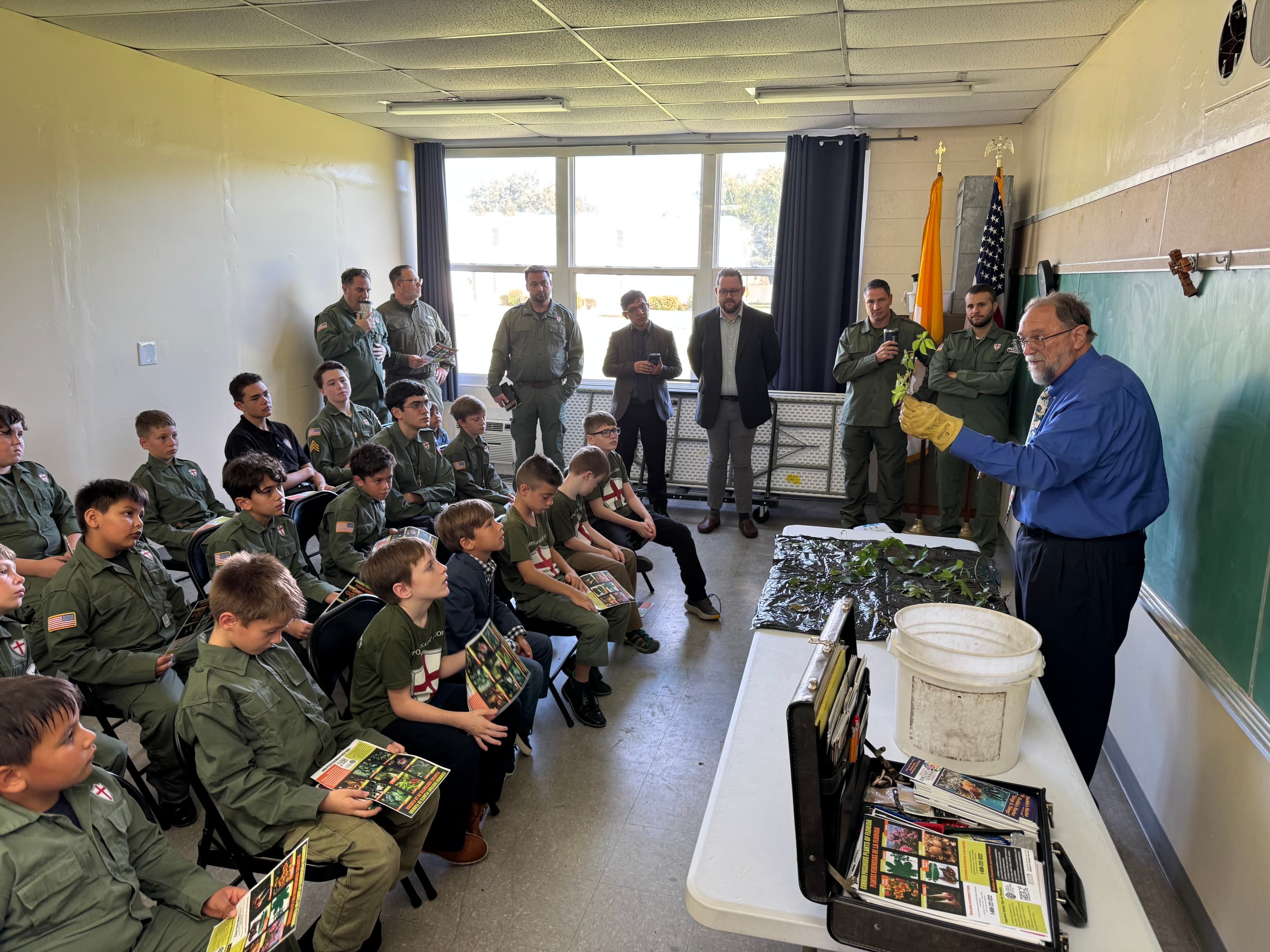 Troop 51 boys seated during Sunday formation